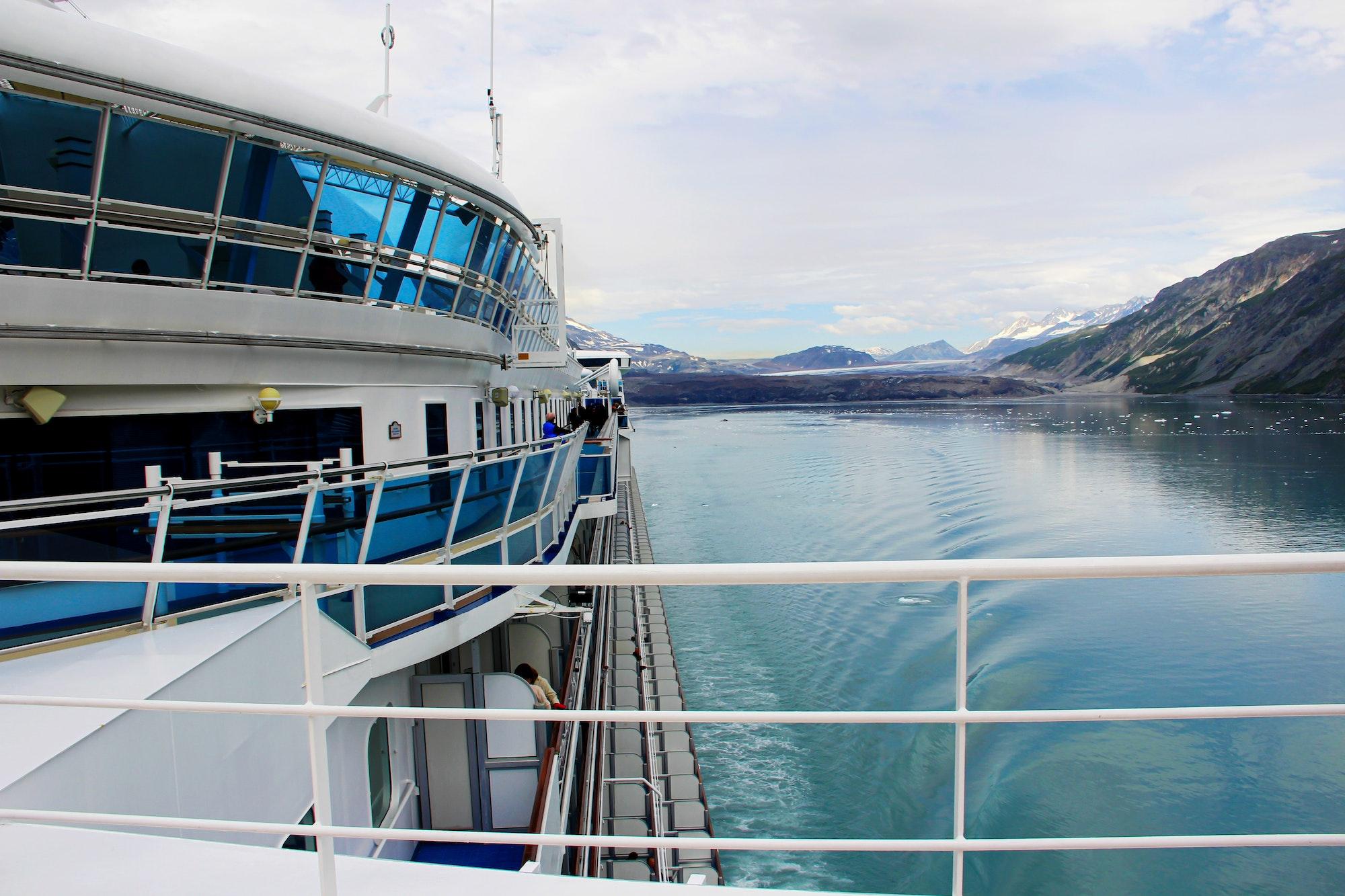 Side view from an Alaskan cruise deck with beautiful glacier & mountains in background