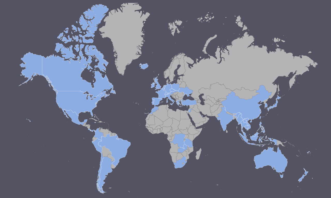 A world map with various countries highlighted in light blue against a dark gray background, useful for travelers applying experience to visualize global regions and international reach.