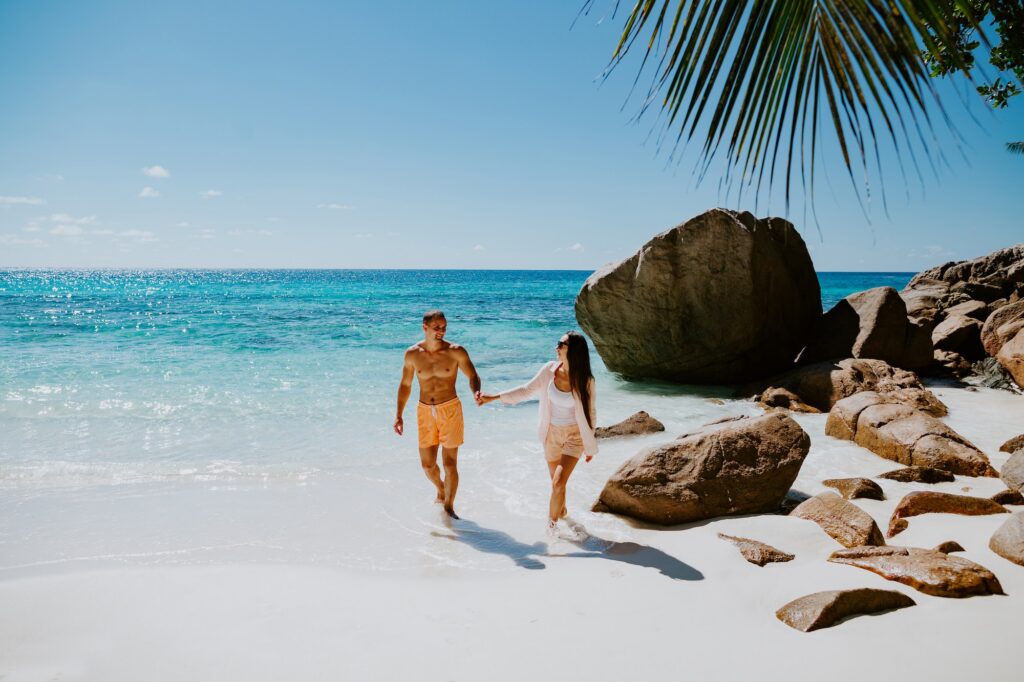 This idyllic tropical setting highlights the exclusive beachfront access and romantic atmosphere typically found at a premier luxury resort.