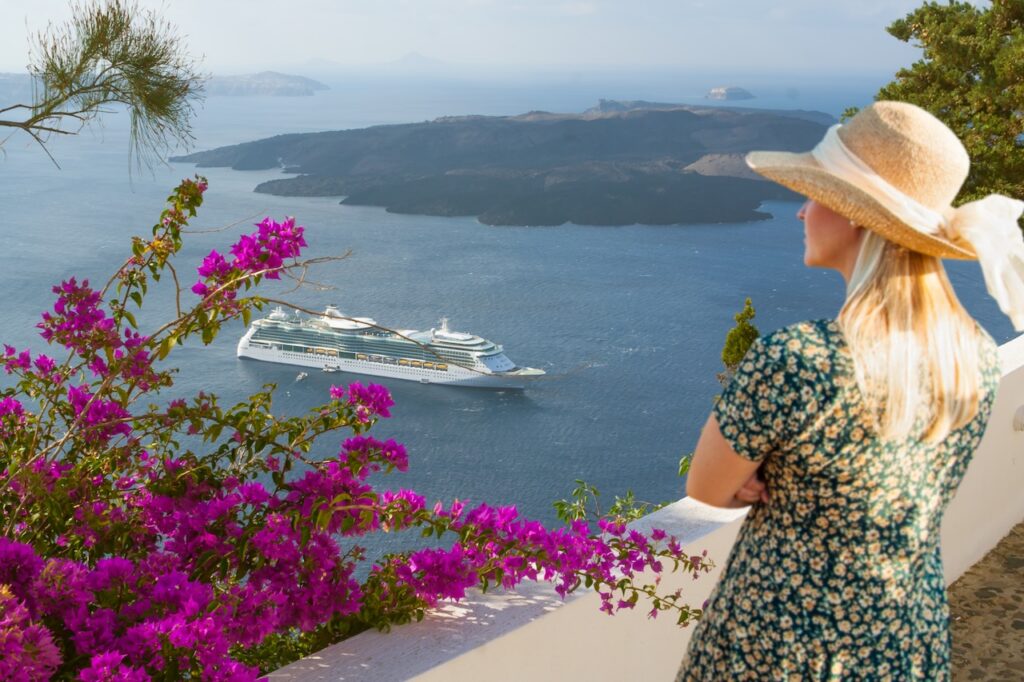 Panoramic view of a British Virgin Islands bay, showcasing anchored yachts and lush hills, perfect for a BVI all-inclusive, adults-only escape vacation.
