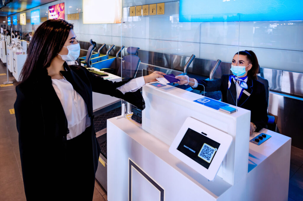 Traveler checking in with TSA PreCheck benefits for faster airport security