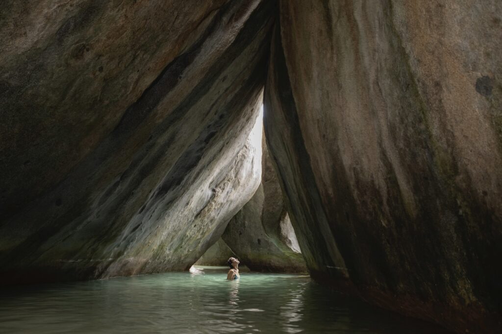 Inside The Baths cave grotto in the British Virgin Islands, highlighting the unique natural adventures perfect for an adults-only escape.