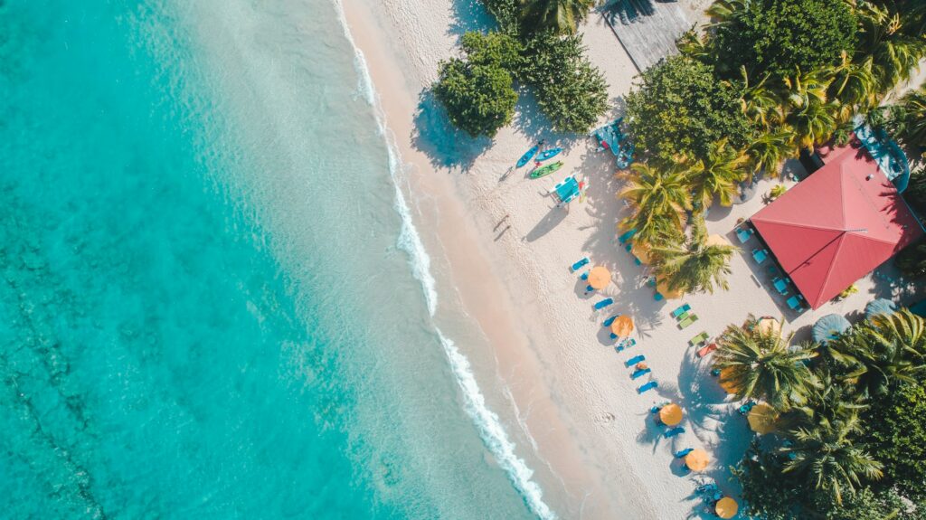 Aerial view of turquoise water at Grand Anse Beach, Grenada, one of the Caribbean islands 2027 travellers are choosing between