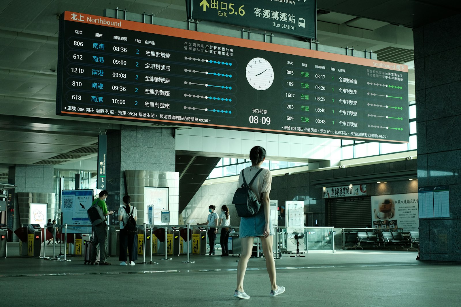 A passenger walking through an airport terminal.